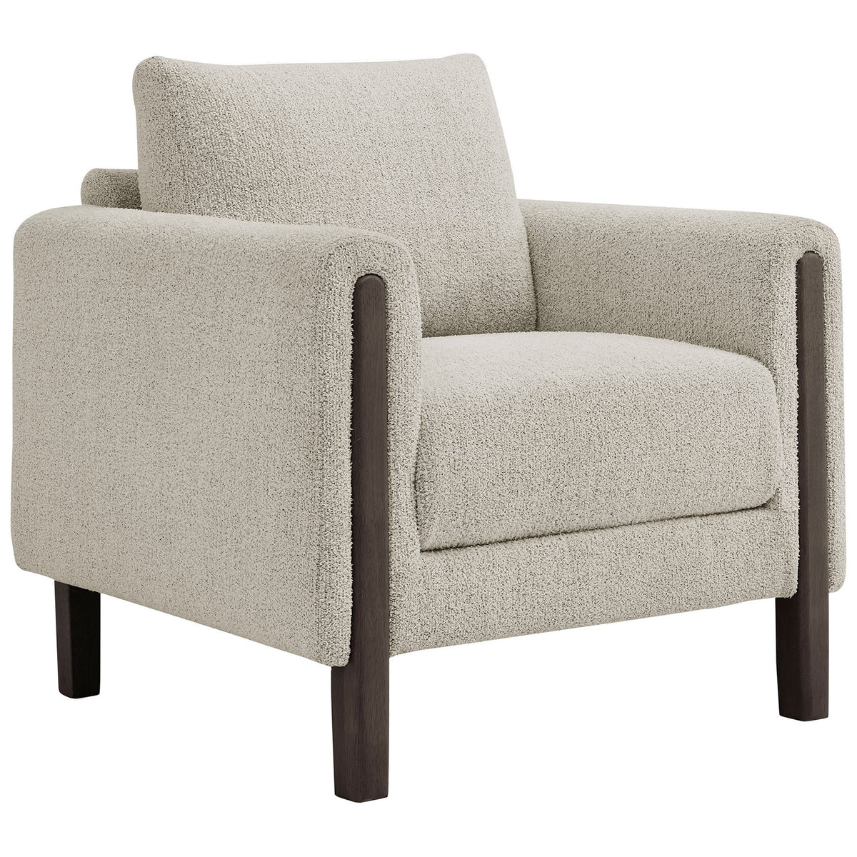 Textured boucle upholstery and rounded arms invite relaxed lounging with timeless appeal. || EEI-7459-PCH-ESP || front_angle_studio