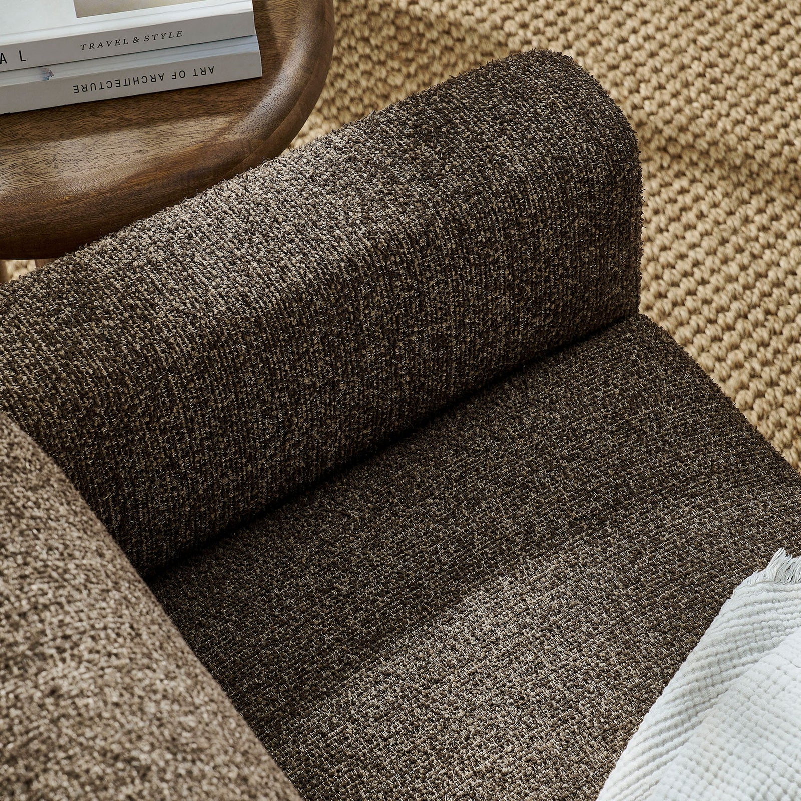 Textured boucle seat and arm in antique espresso paired with a natural jute rug and warm wood side table || EEI-7460-ATQ-ESP || swatch_room