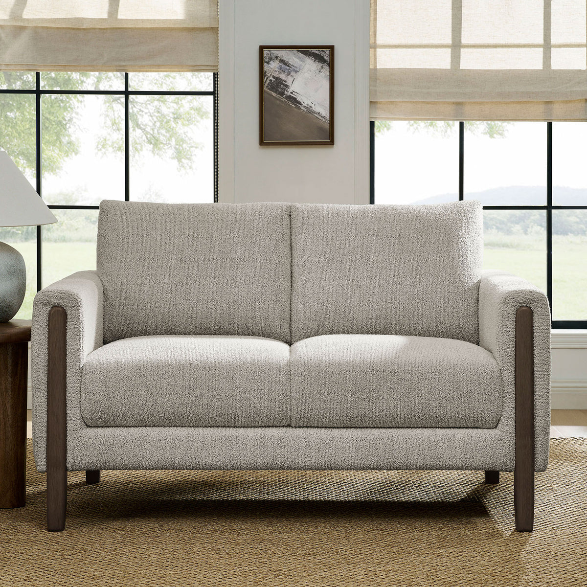 Parchment boucle loveseat styled with jute rug, wood side table, and bright windowed living room backdrop || EEI-7460-PCH-ESP || front_room