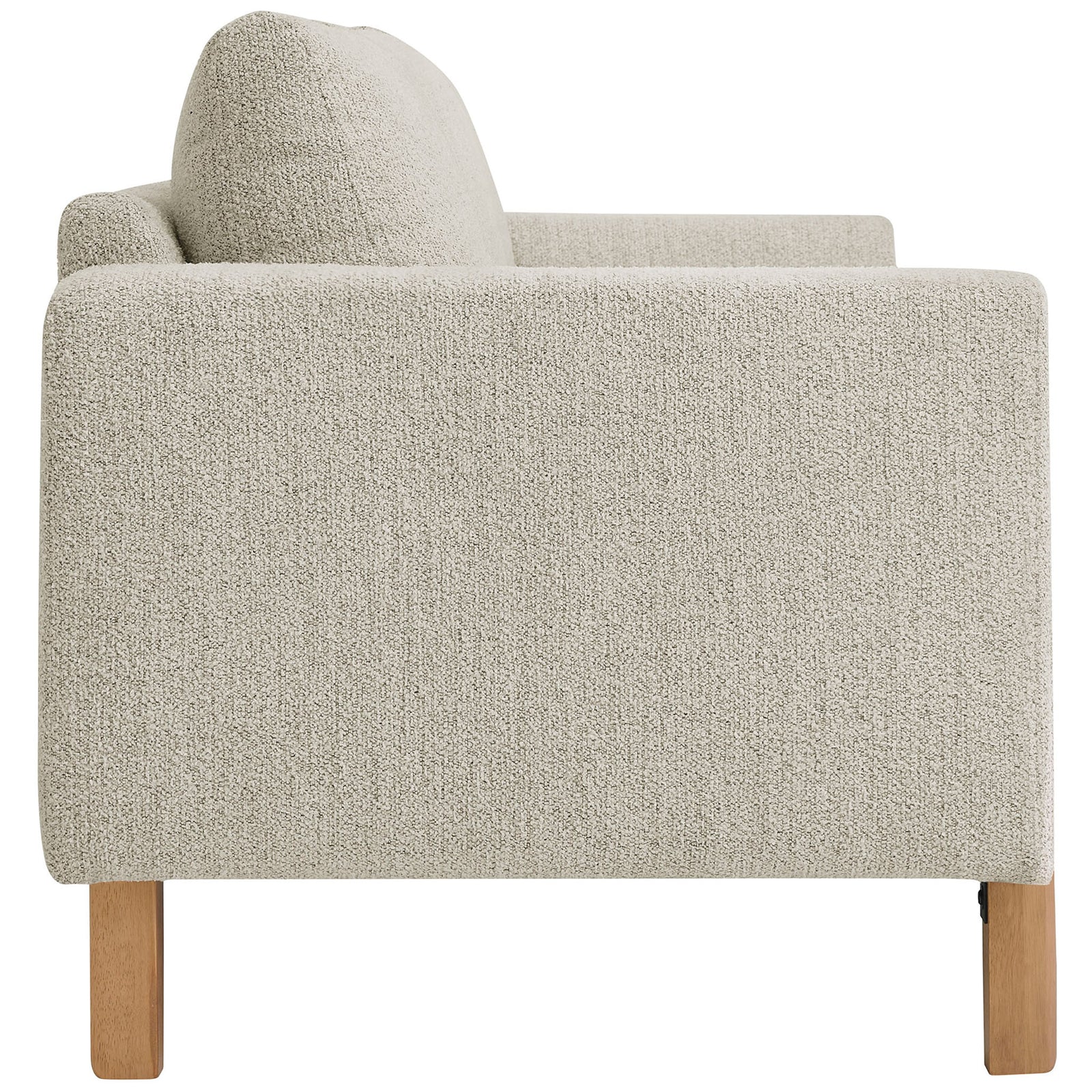 Streamlined sofa profile highlighting the slim track arm and textured parchment boucle upholstery || EEI-7461-PCH-BEE || side_studio