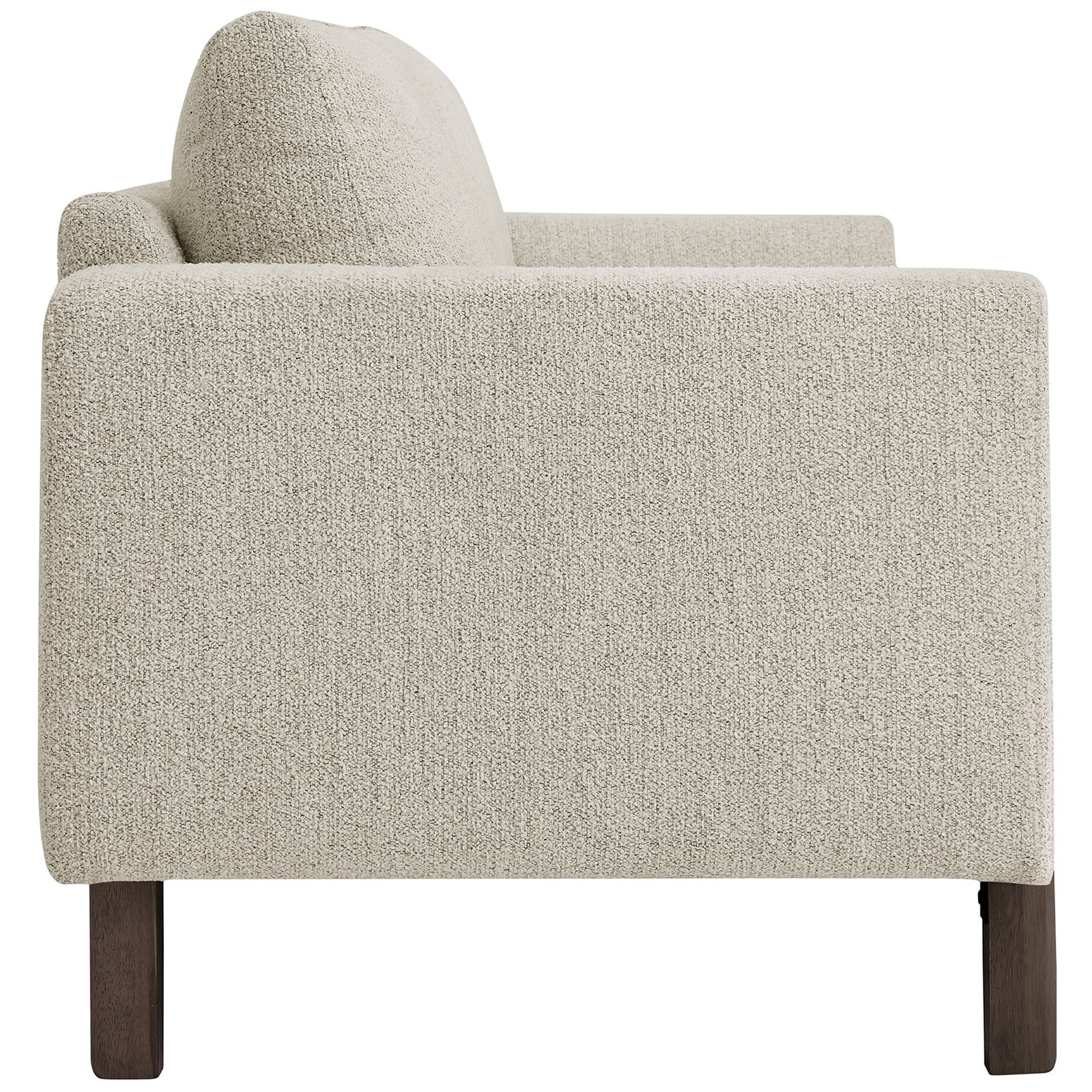 Slim profile of the boucle sofa highlighting plush back cushions and gently sloped arms || EEI-7461-PCH-ESP || side_studio