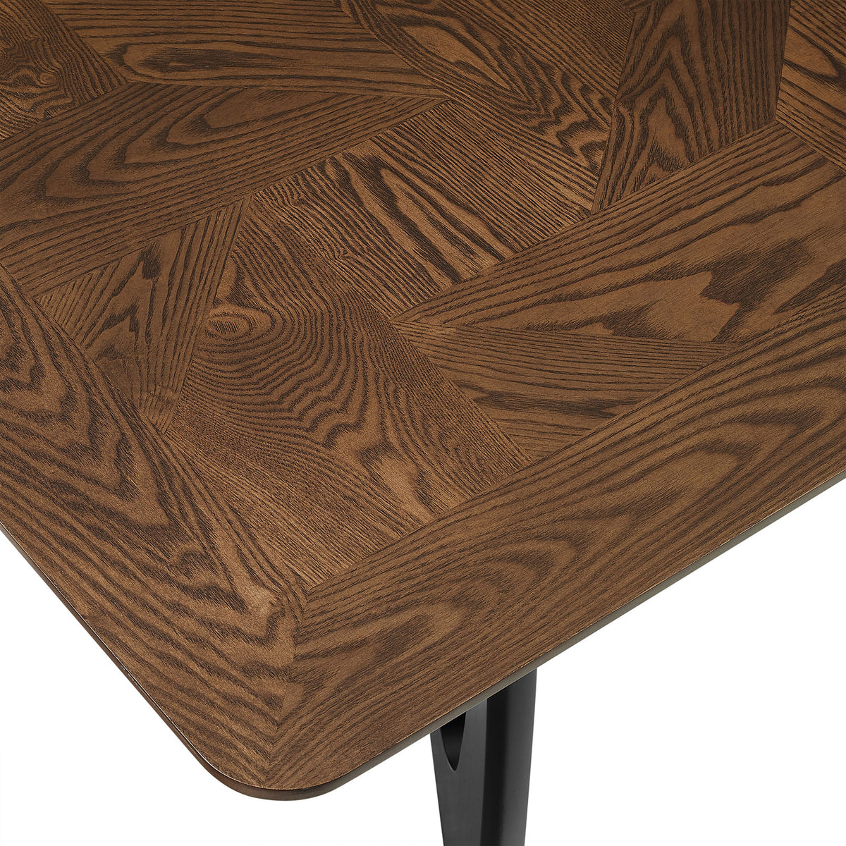 Walnut tabletop corner shows the intricate angled veneer pattern and smooth beveled edge detail. || EEI-7462-WAL || detail_studio