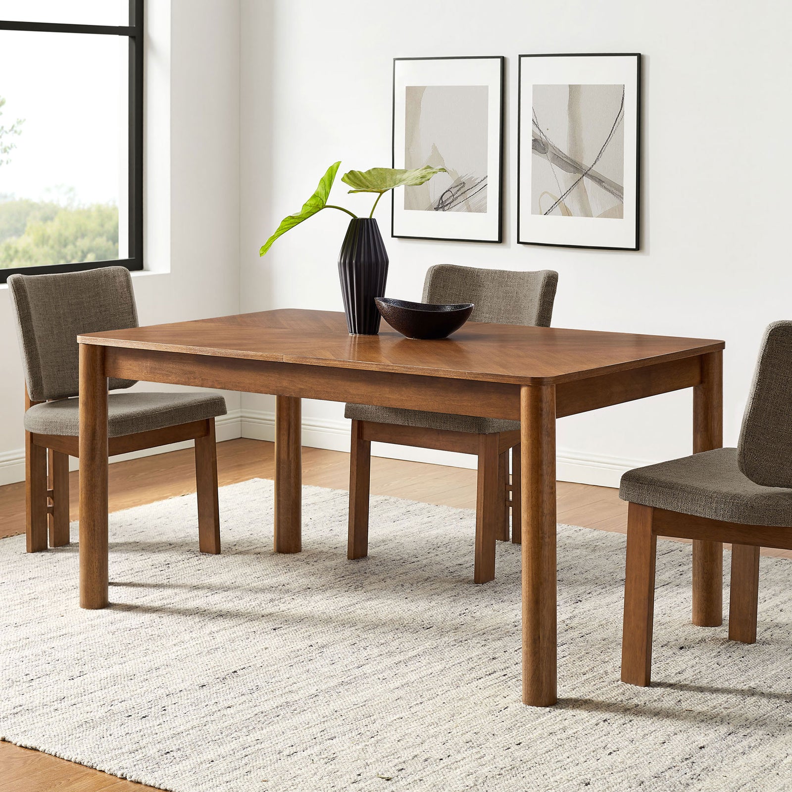 Walnut extendable dining table anchors a cozy room with soft rounded legs and neutral chairs || EEI-7464-WAL || front_angle_room