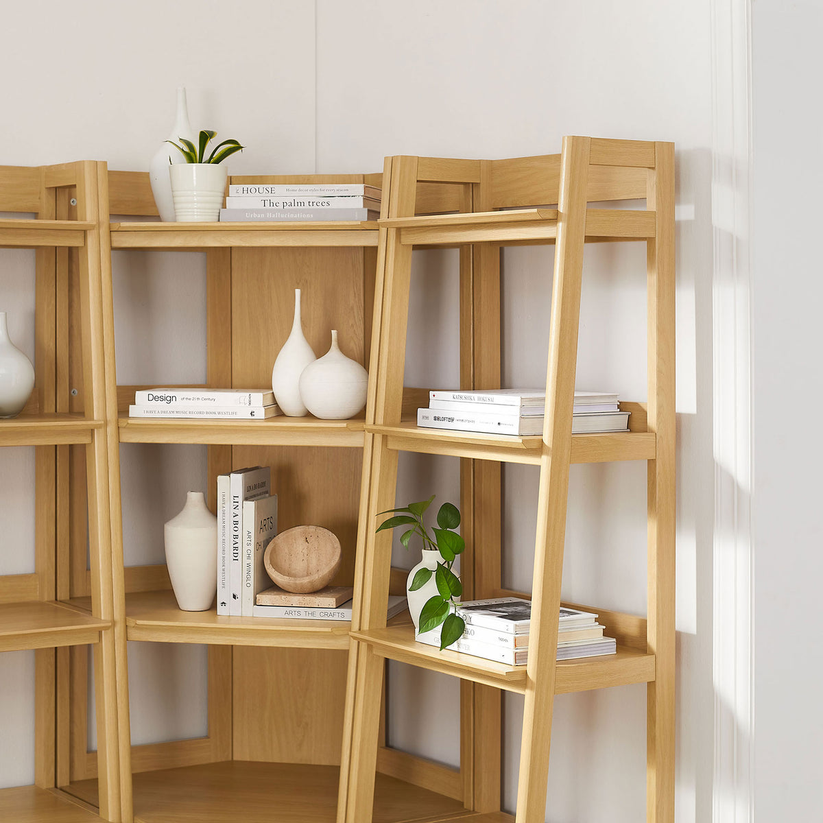 Styled shelves showcase decor and books, adding warmth and texture to your space. || EEI-7470-OAK || detail_room