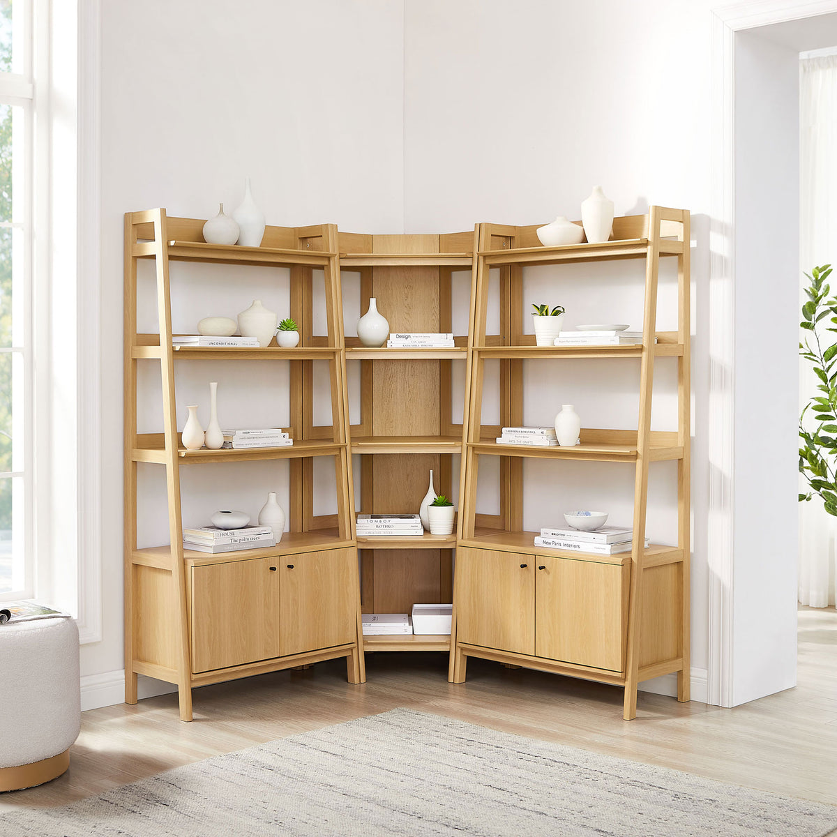 Versatile corner shelving set brings light oak warmth and airy lines to your living room || EEI-7471-OAK || front_room