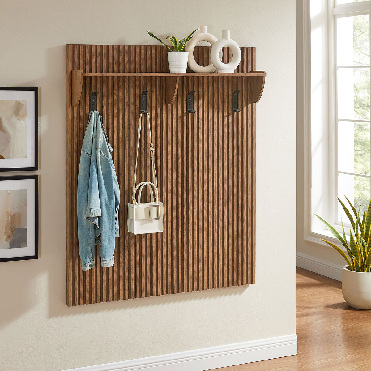 Wall-mounted slatted walnut coat rack with shelf, holding decor and daily essentials || EEI-7472-WAL || front_room