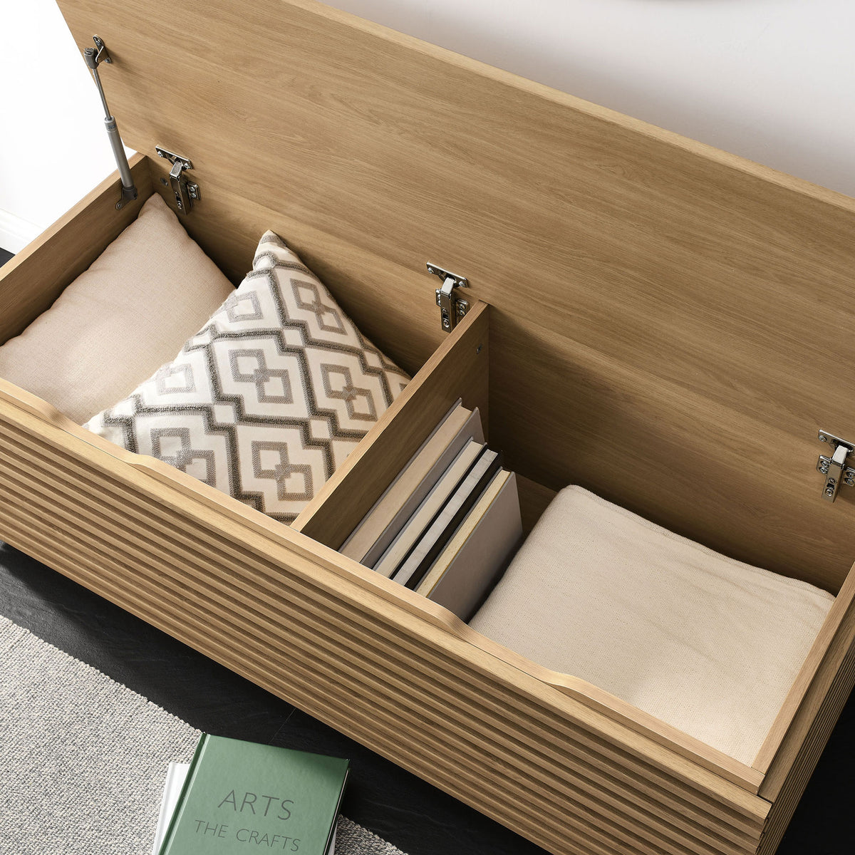 Flip-top bench opens to a divided interior for pillows, books, and daily essentials || EEI-7473-OAK || storage_open_room