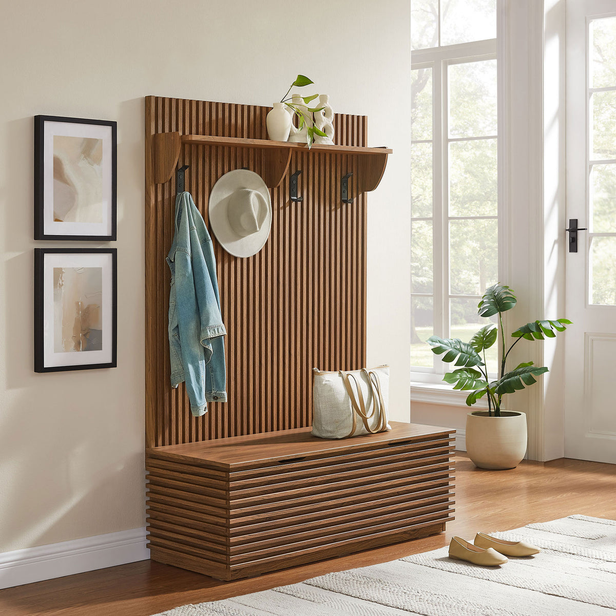 Streamlined hall tree elevates the entry with warm walnut tones and practical hooks, shelf, and bench storage || EEI-7473-WAL || front_angle_room