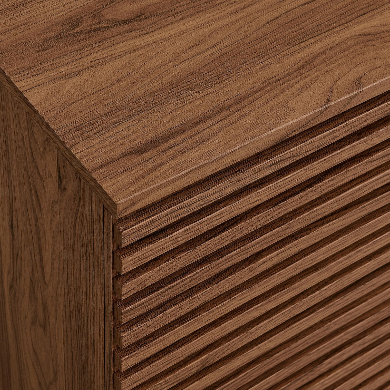 Detail of the walnut wood grain and horizontal fluted slats on the Render accent cabinet doors || EEI-7476-WAL || swatch_studio
