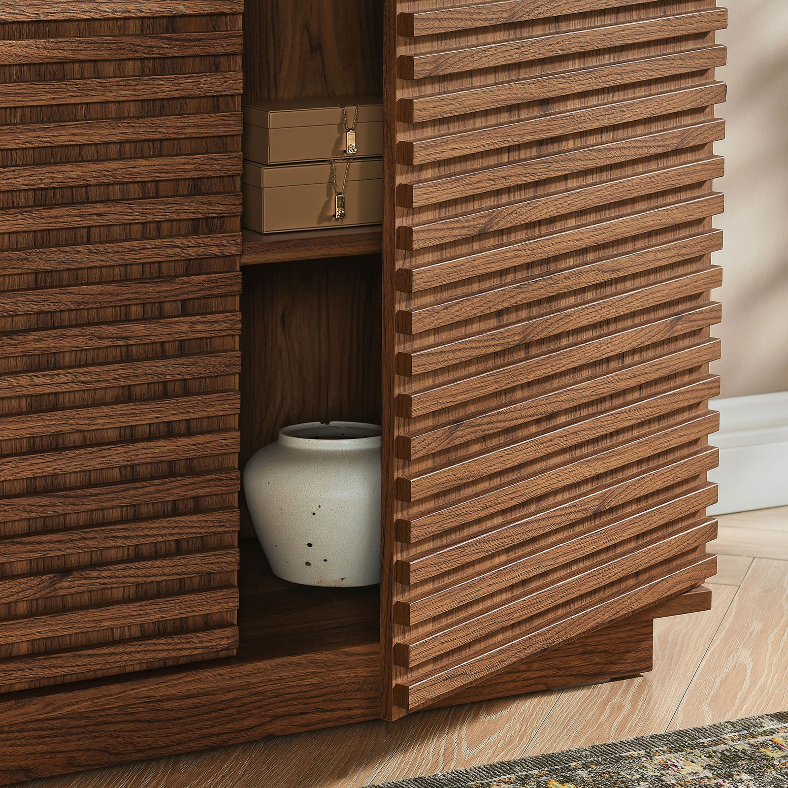 Render walnut cabinet storage with fluted door partially open revealing shelf space for decor and essentials || EEI-7476-WAL || storage_open_room