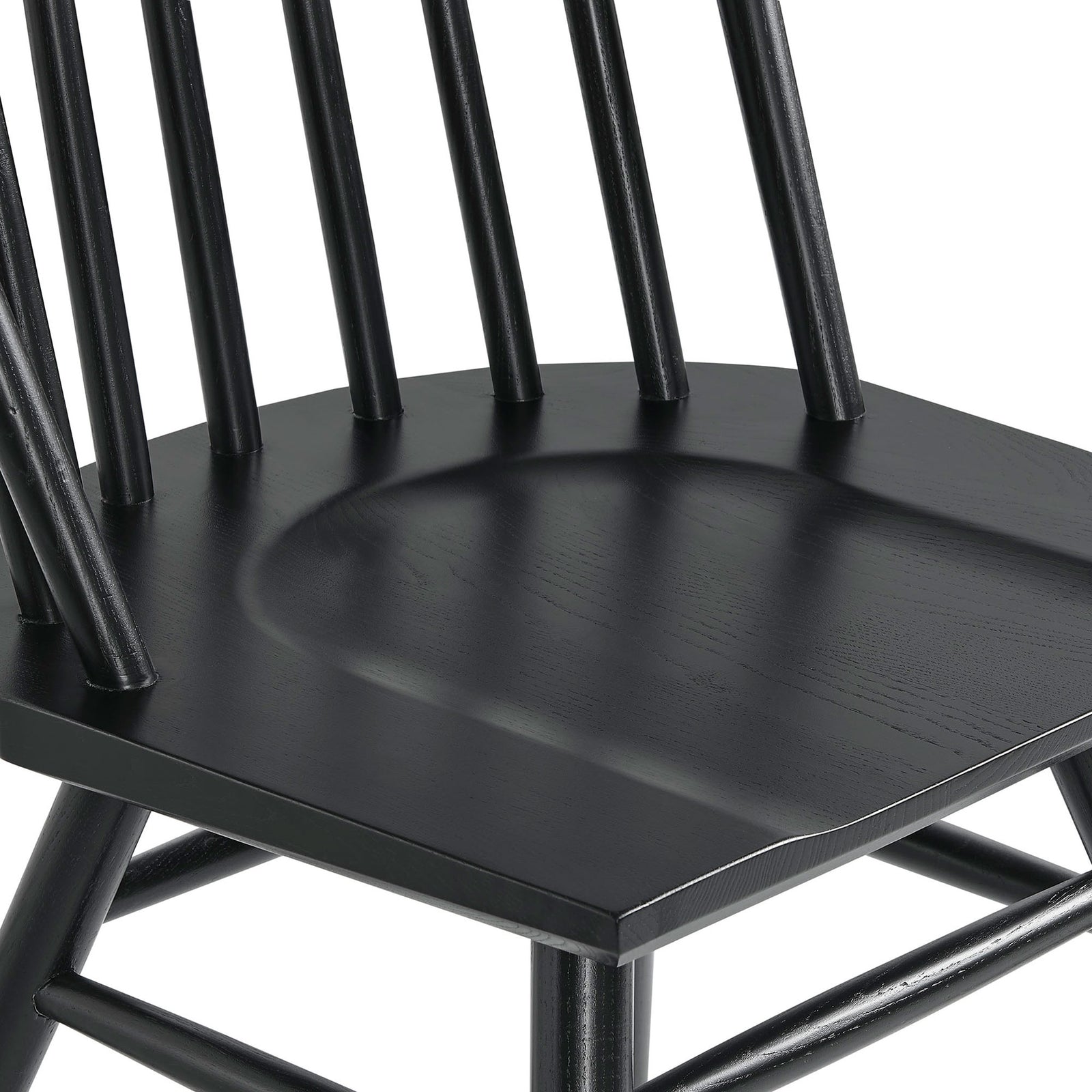Black ash wood dining chair seat with deep contouring, rounded edges, and subtle wood grain texture. || EEI-7482-BLK || detail_studio