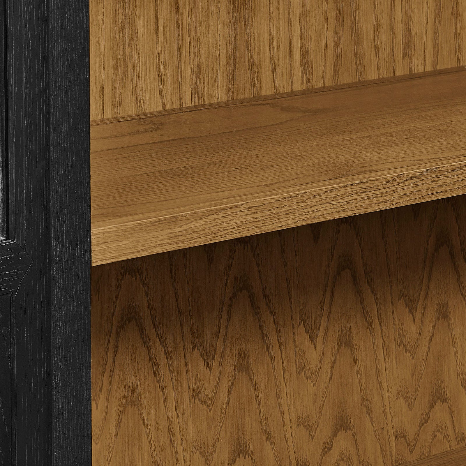 Warm oak interior shelving and back panel with rich natural grain for a soft contrast to the black frame || EEI-7484-BLK-OAK || swatch_studio