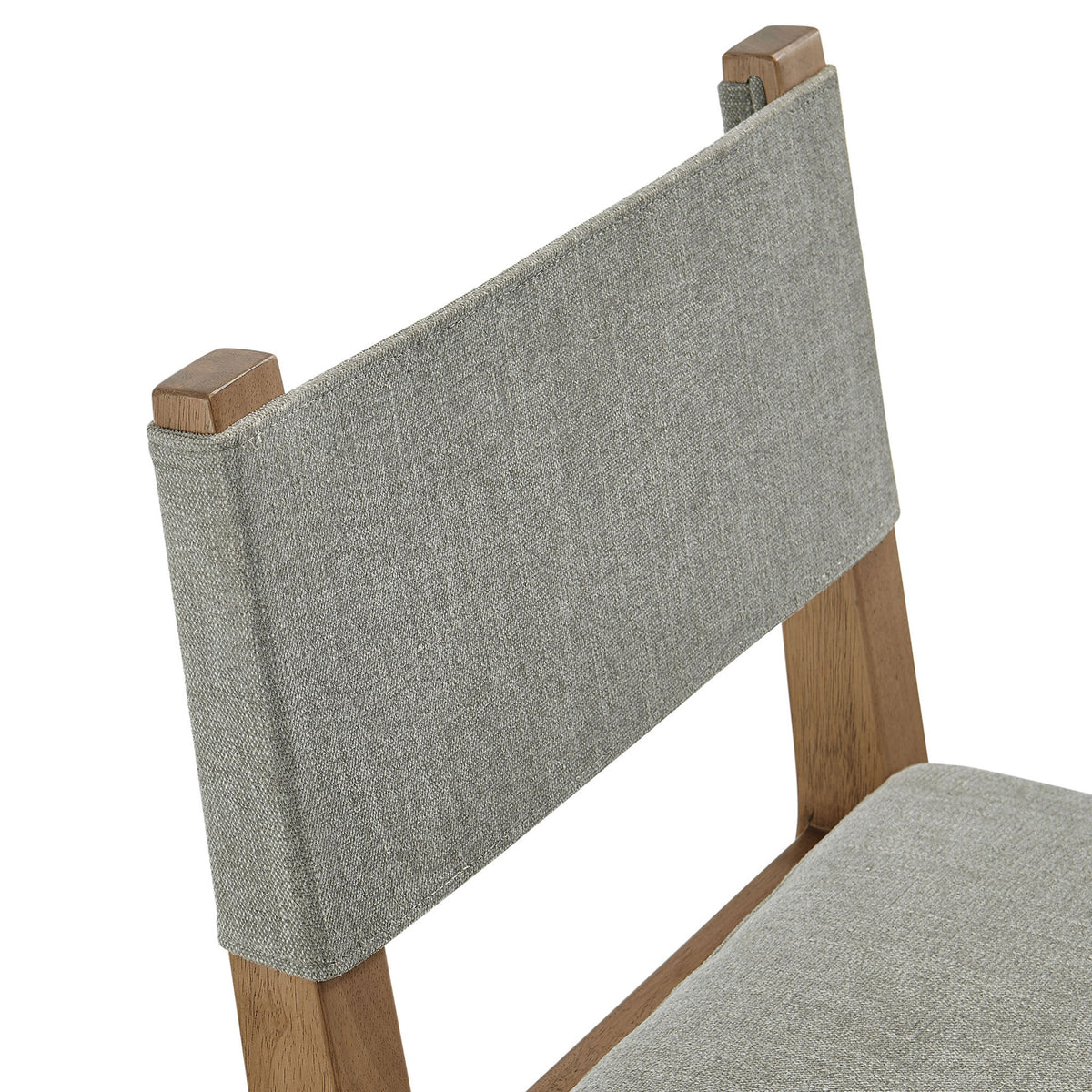 Textured wheat fabric backrest detail highlighting tailored upholstery and smooth wood posts || EEI-7485-HEW || detail_studio