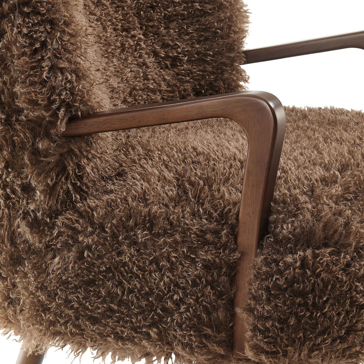 Smooth wood armrest and rich faux shearling texture deliver tactile contrast and comfort. || EEI-7487-BRN || detail_studio