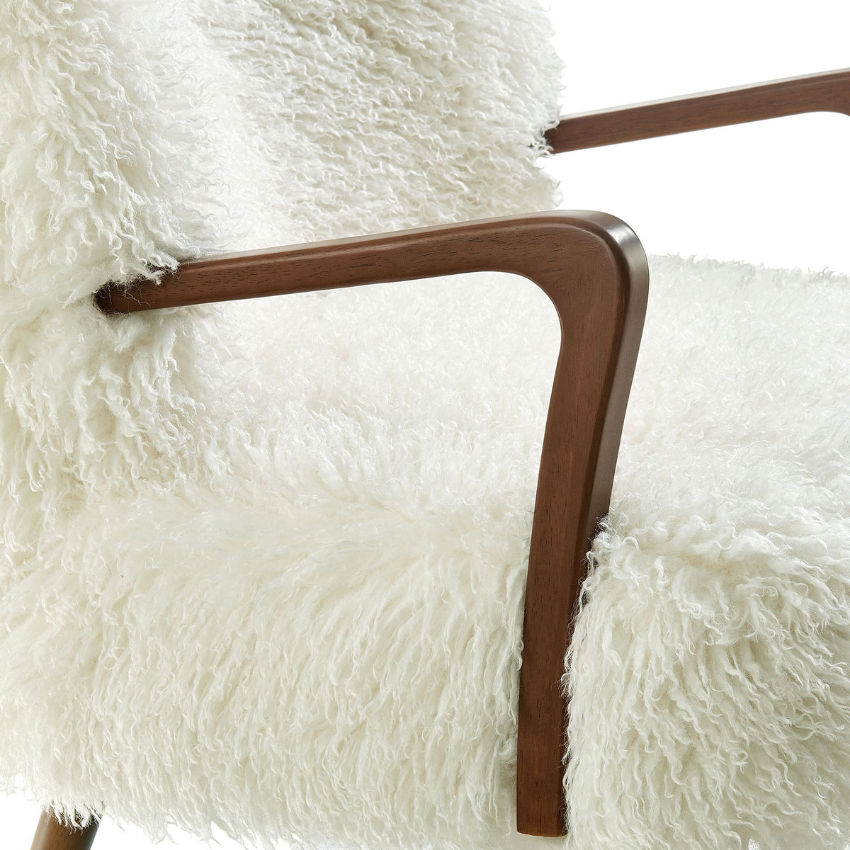 Smooth walnut-tone armrest contrasts the lofty shearling texture for tactile appeal || EEI-7487-WHI || detail_studio