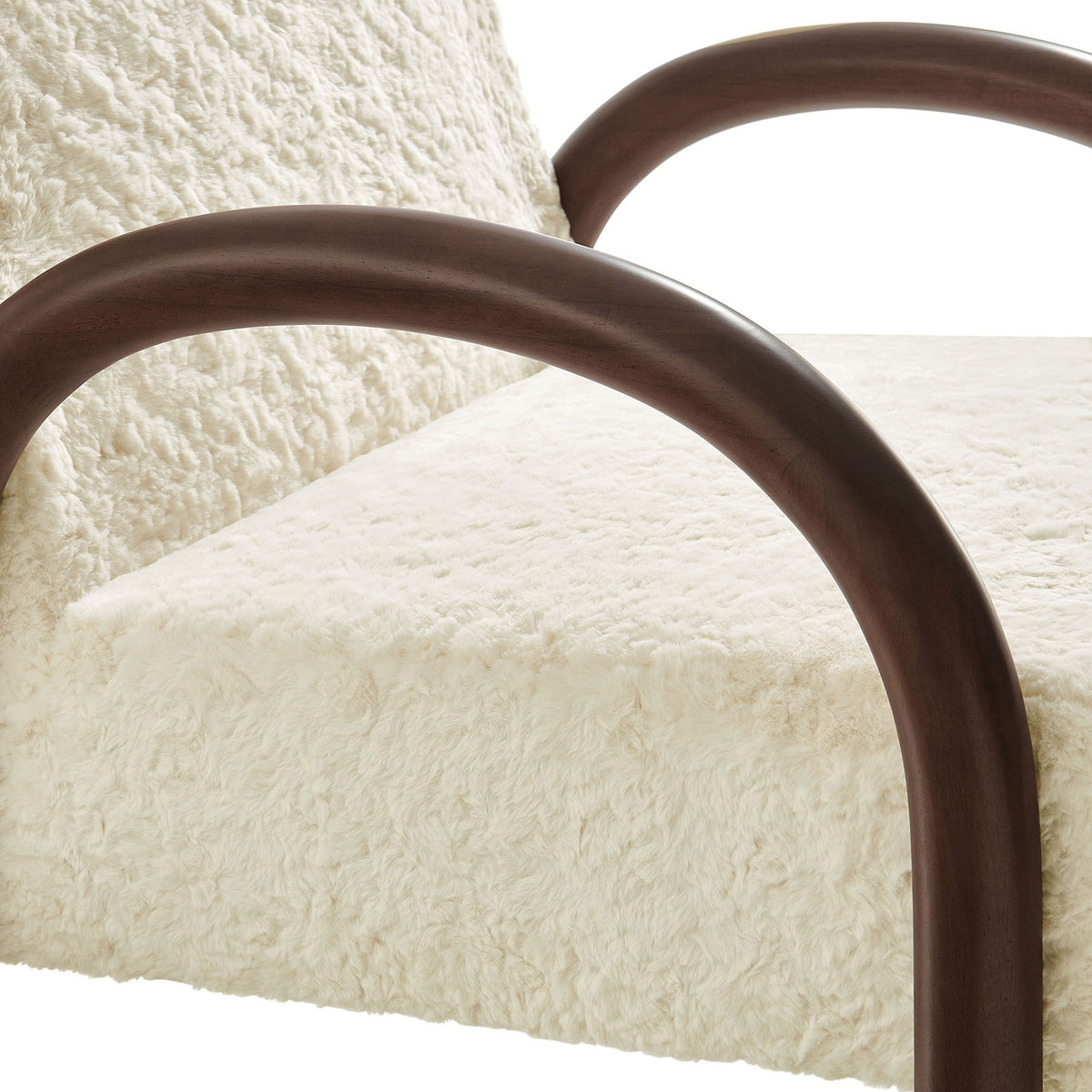 Soft faux shearling upholstery meets a smooth, rounded wood arm for tactile contrast || EEI-7488-ECR || detail_studio