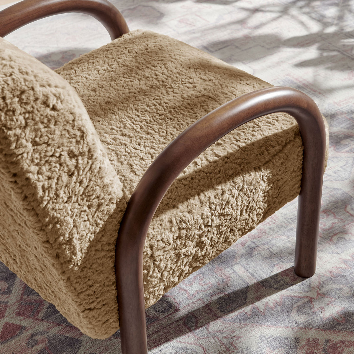 Rich wood grain contrasts with plush sand faux shearling for tactile warmth || EEI-7488-SAN || detail_room