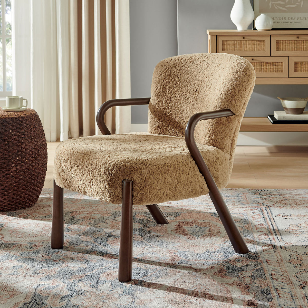 Cozy faux shearling accent chair anchors the room with its rounded wood legs and soft profile || EEI-7489-SAN || front_angle_room