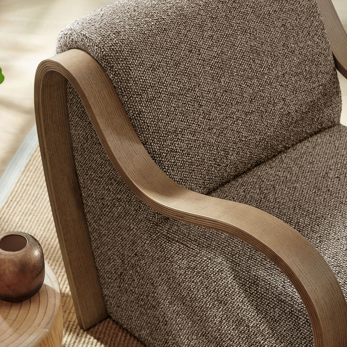 Warm wood grain and boucle texture add depth to modern living spaces. || EEI-7490-ETH || detail_room