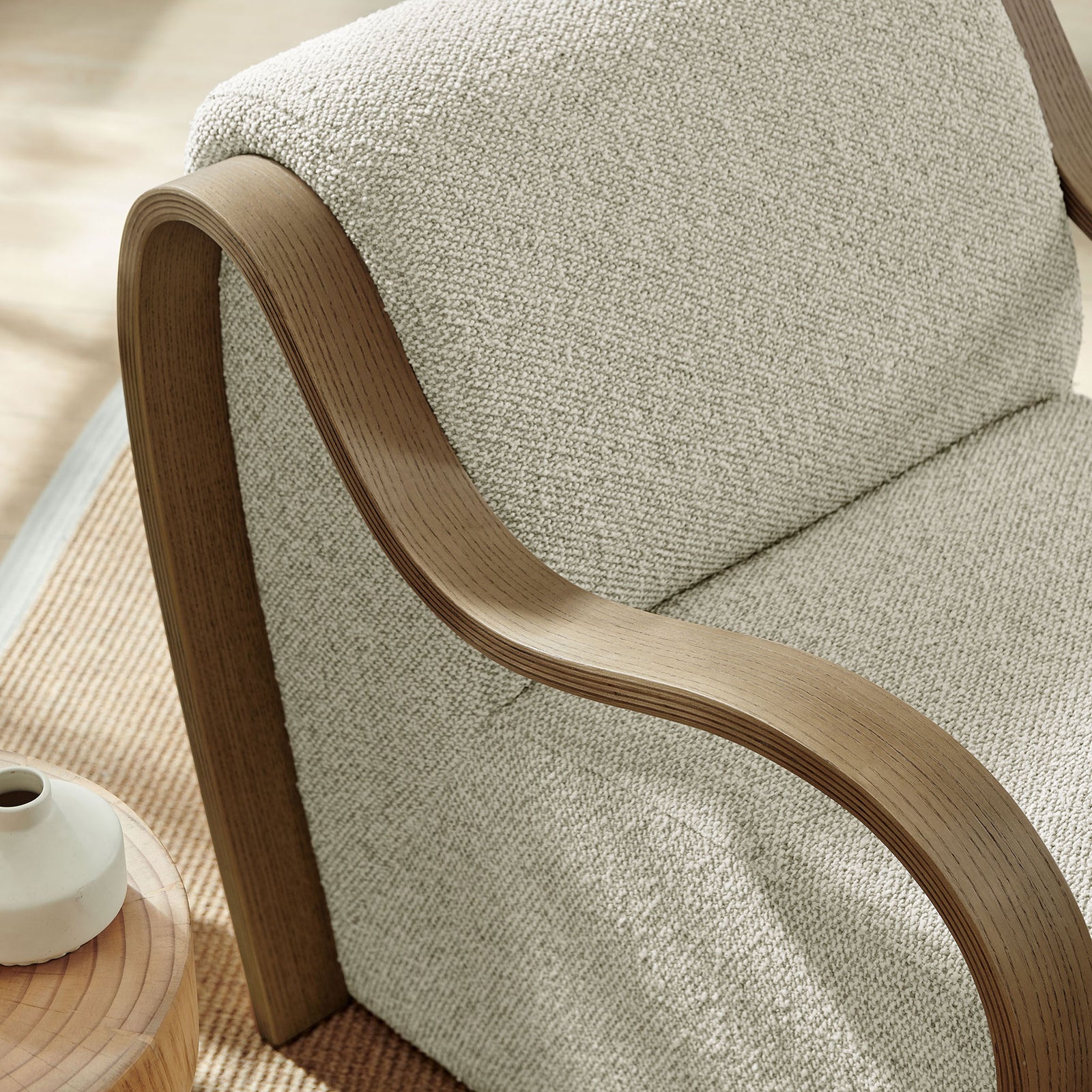 Cozy lattice boucle texture and gently curved bentwood arm bring warmth and character to the space || EEI-7490-MRB || detail_room
