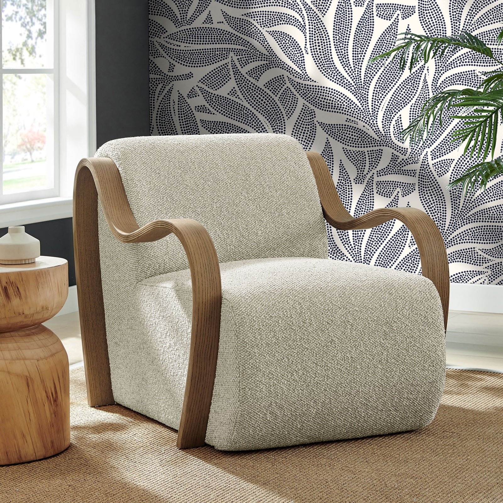 Statement armchair in marble boucle with sculptural wood arms that elevate modern living rooms || EEI-7490-MRB || front_angle_room