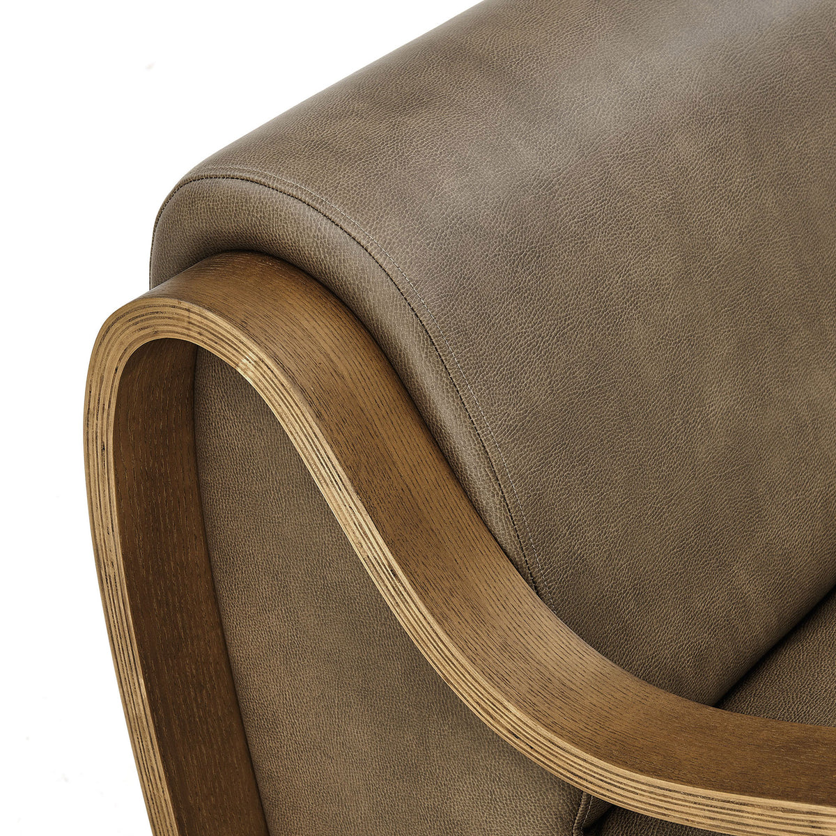 Pebbled vegan leather and layered bentwood arm highlight refined stitching and craftsmanship. || EEI-7491-MUS || detail_studio