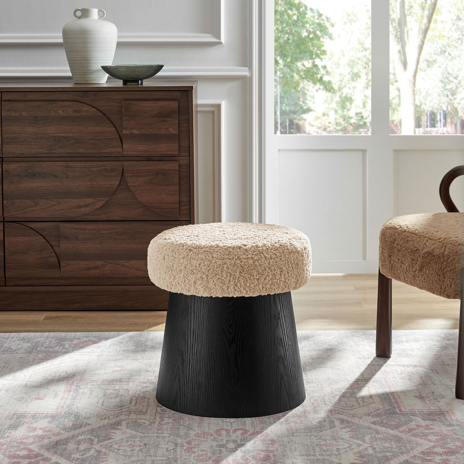 Oatmeal faux shearling ottoman pairs with modern wood furniture to complete a warm, inviting living space || EEI-7493-OAT-BLK || front_angle_room