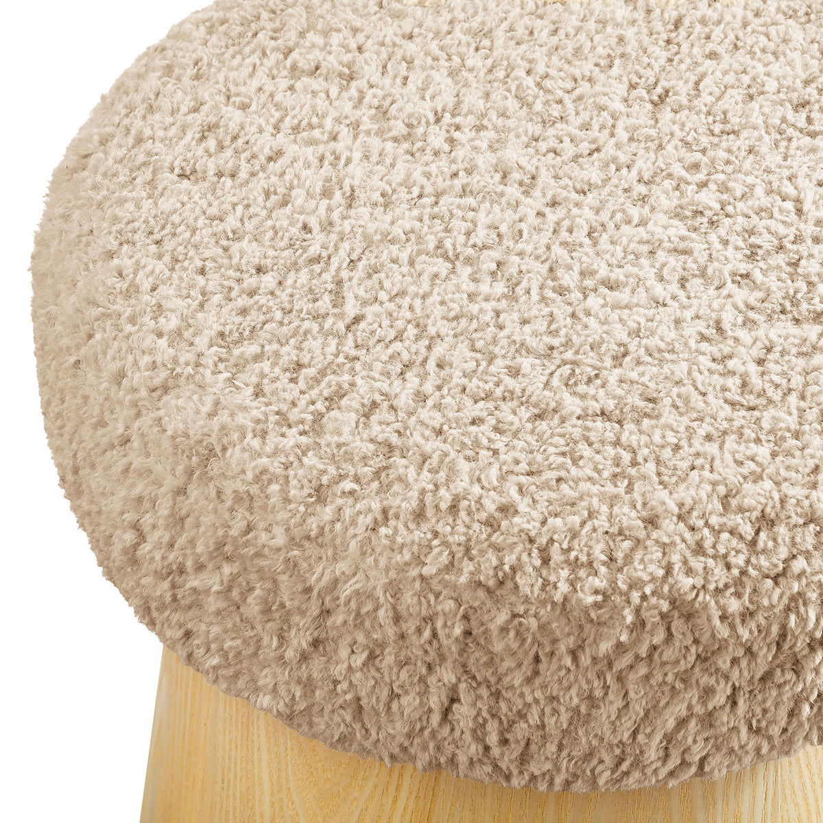 Soft faux shearling upholstery on the Ketra ottoman showcasing its inviting textured oatmeal pile || EEI-7493-OAT-OAK || detail_studio
