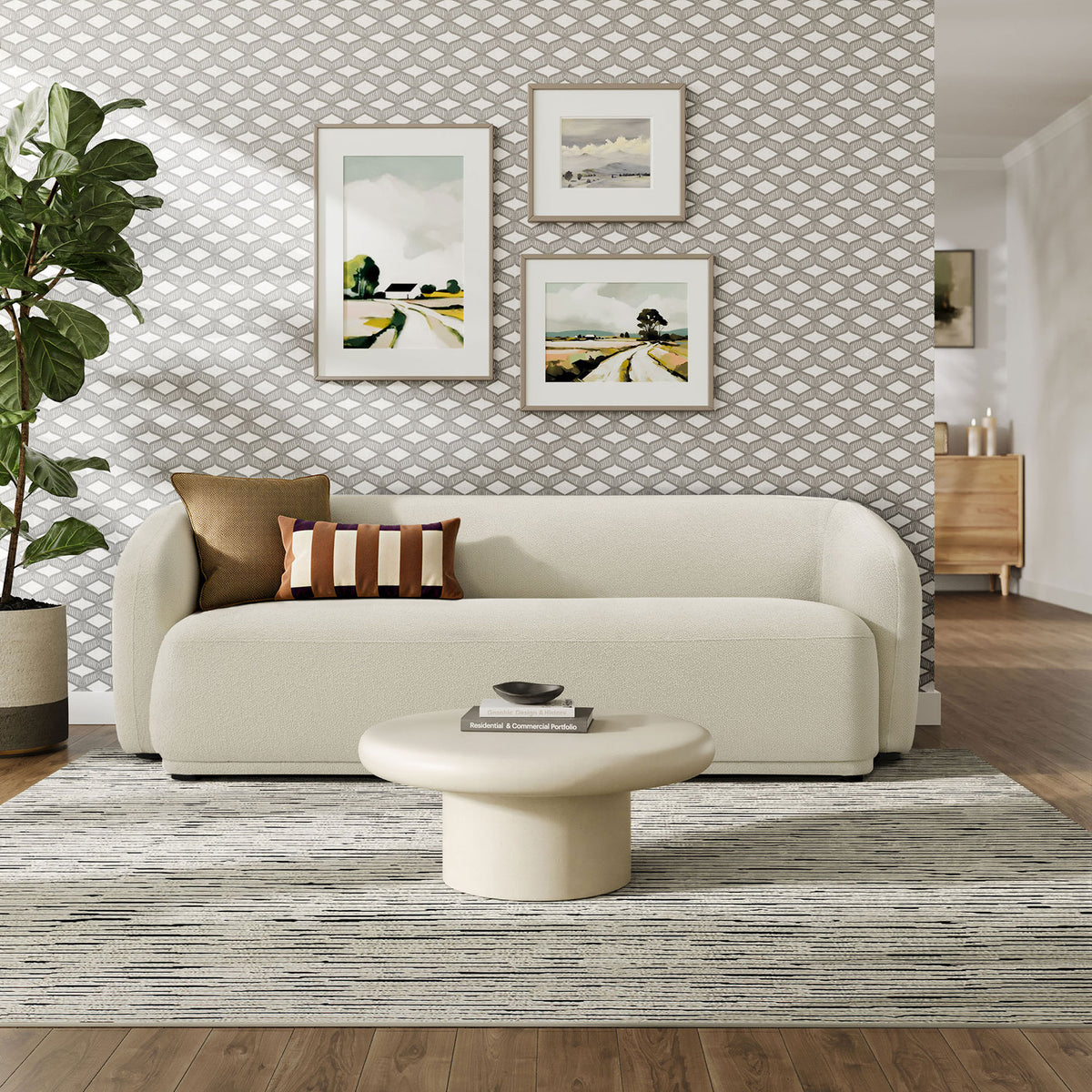 Cream boucle sofa styled with modern art, rug, and accent table for a warm, inviting living room || EEI-7501-CRE || front_room