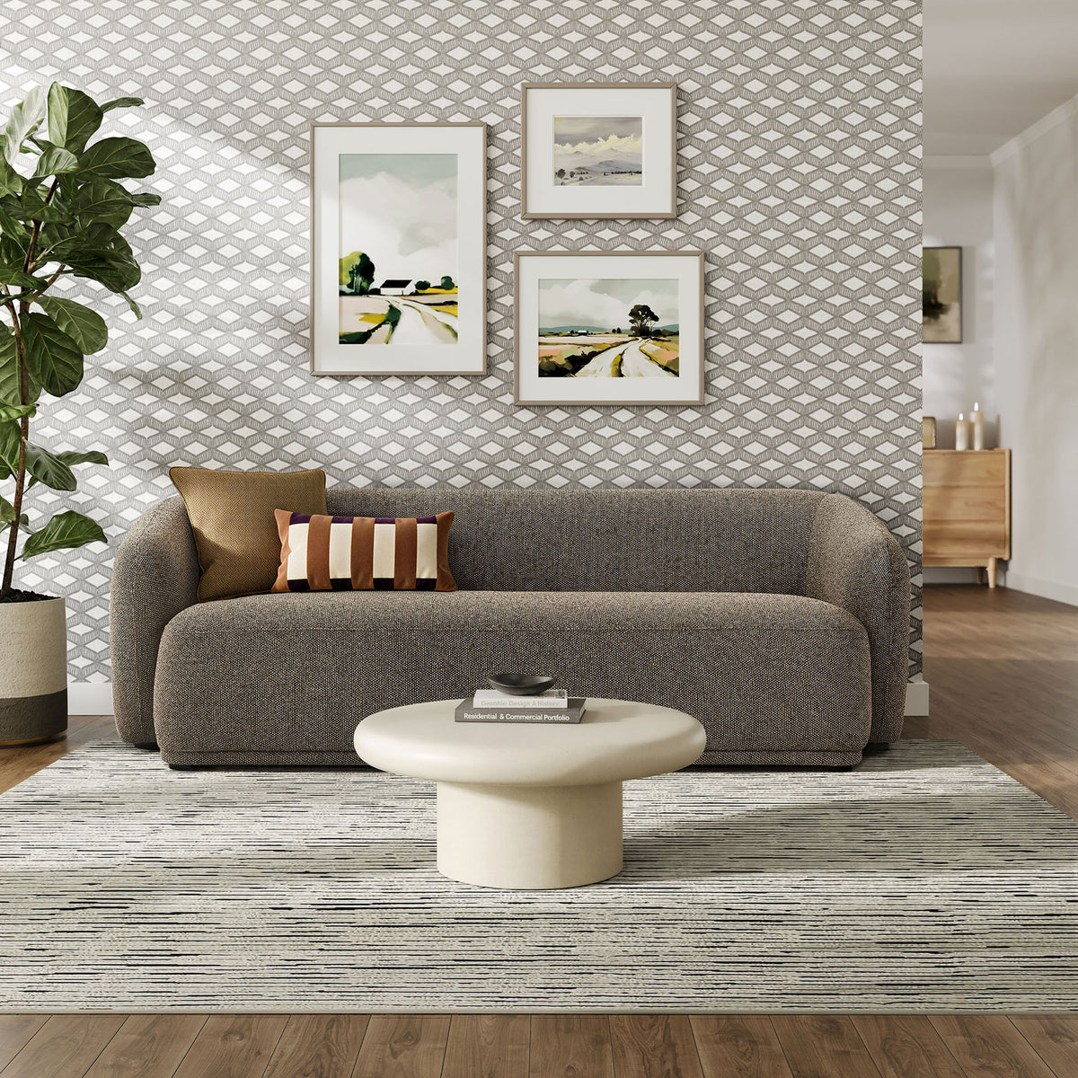Earth boucle sofa anchored in a modern living room with layered rug, art, and cozy accent pillows || EEI-7501-ETH || front_room