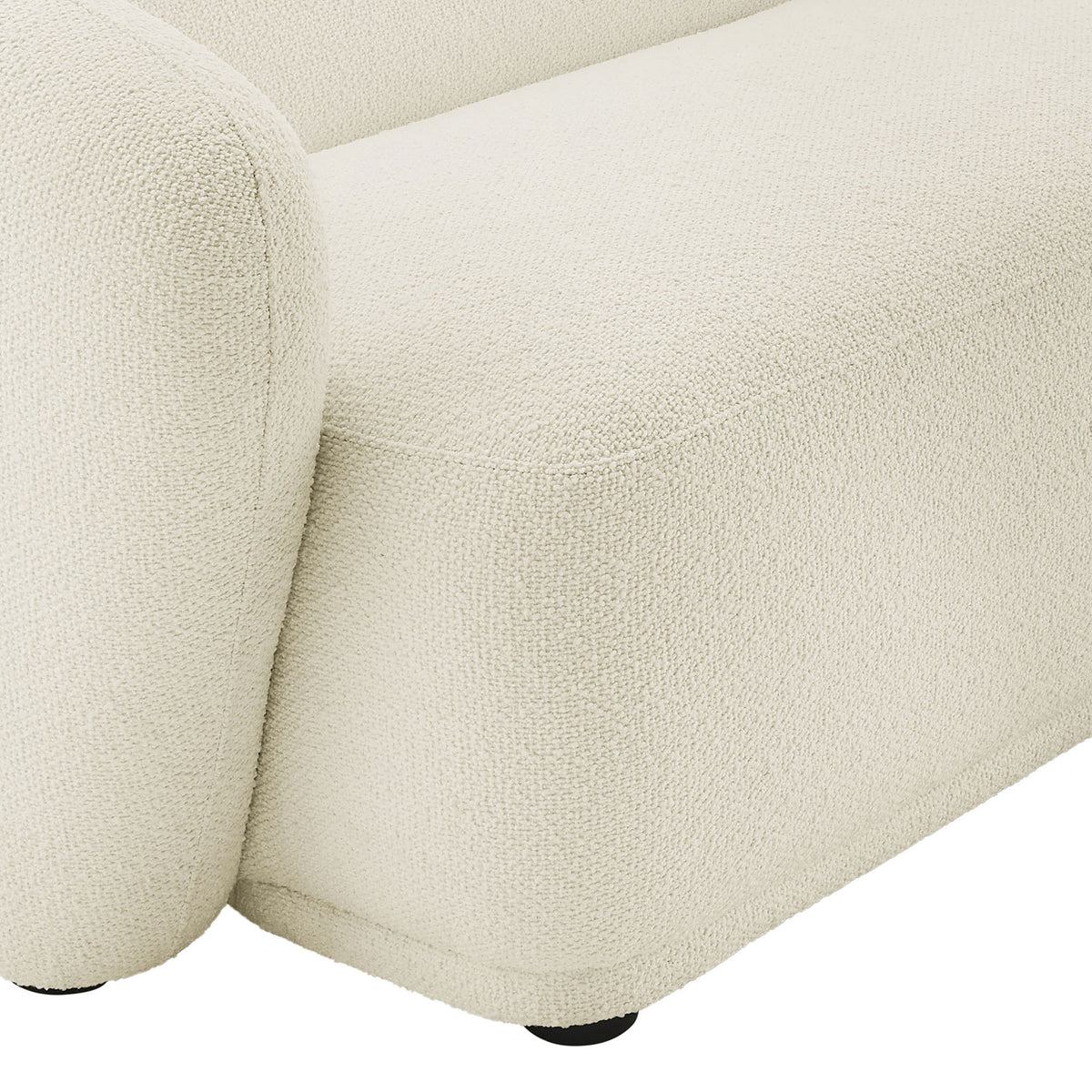 Textured cream boucle upholstery wraps the Monica sectional seat and arm in plush softness. || EEI-7503-CRE || swatch_studio