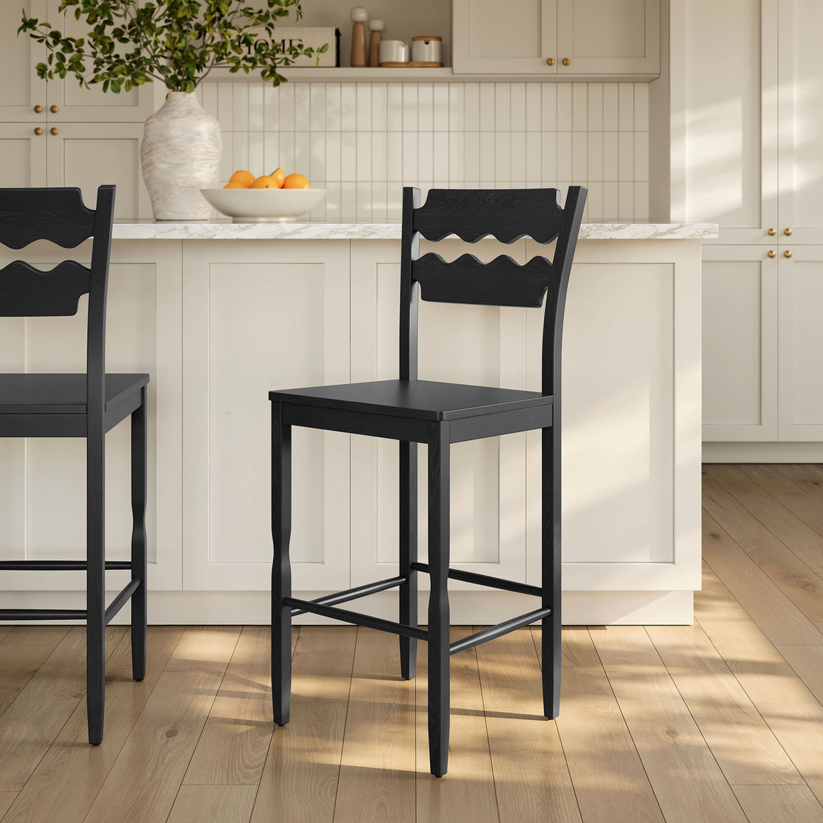 Bar stool elevates the kitchen with bold black finish and timeless bistro character || EEI-7506-BLK || front_angle_room