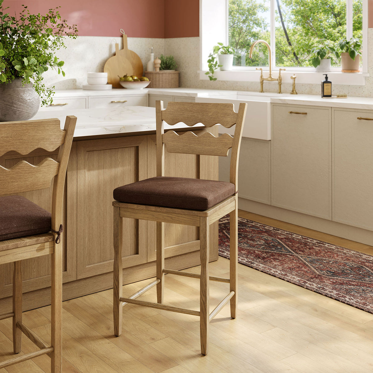 Warm oak counter stool elevates a cozy kitchen with its sculpted back and cocoa cushion || EEI-7518-WOA-COA || front_angle_room