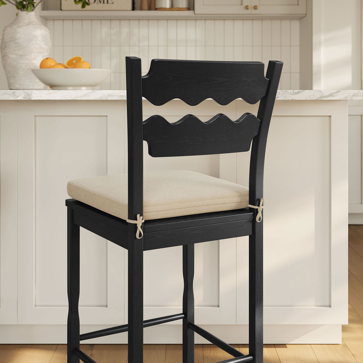 Artful backrest and supportive stretcher base deliver style and stability at the bar || EEI-7519-BLK-LIN || back_angle_room