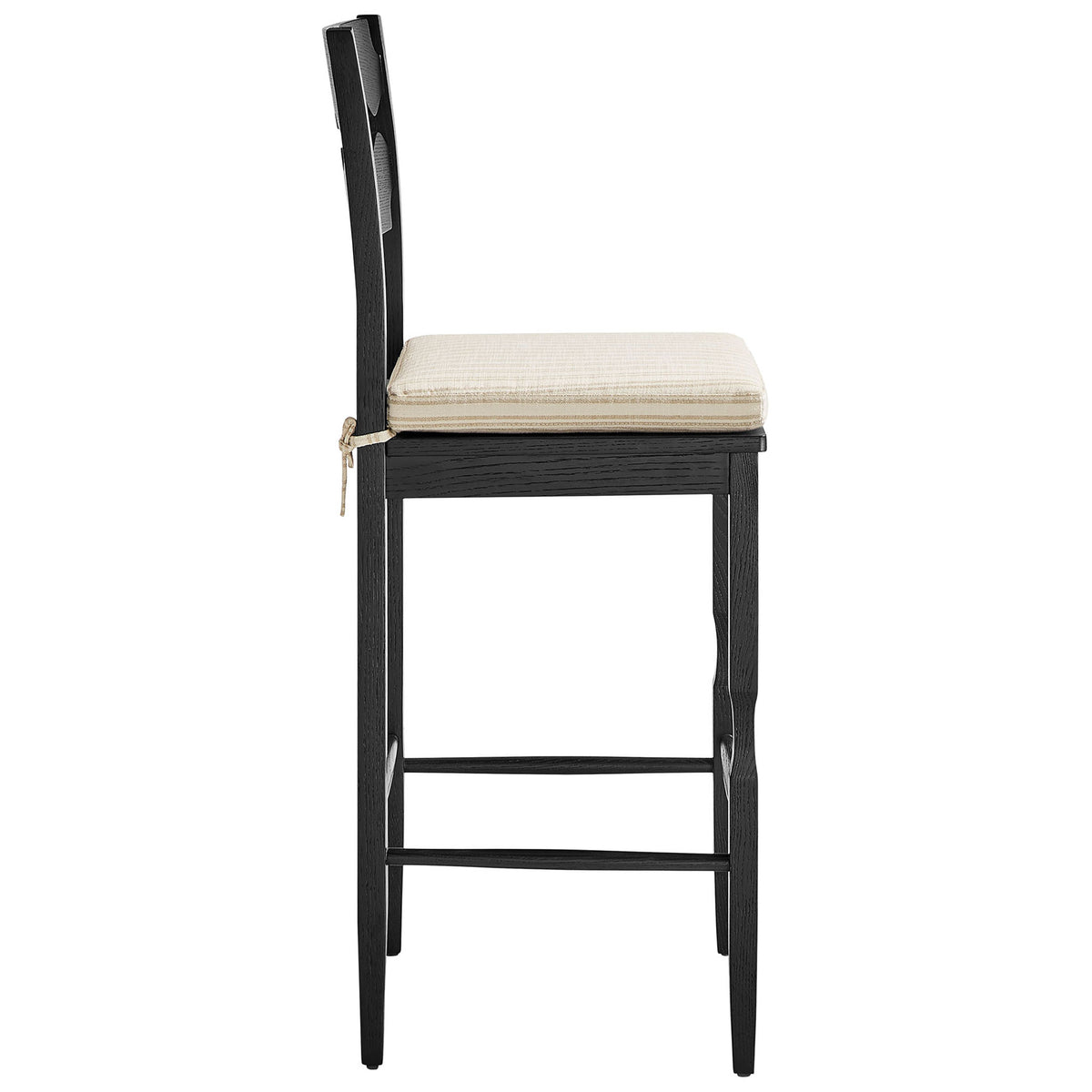 Tall profile emphasizes the supportive footrest and plush tie-on cushion. || EEI-7519-BLK-OAS || side_studio