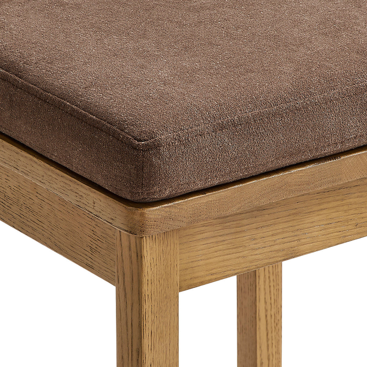 Plush, piped cocoa cushion offers soft support and clean, tailored edges || EEI-7519-WOA-COA || detail_studio