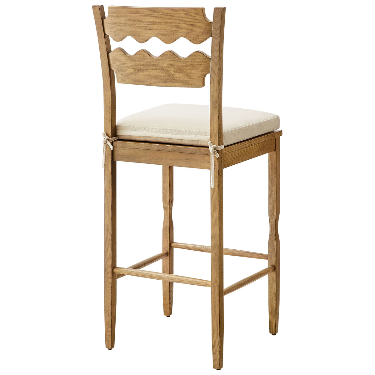 Signature wavy back and neatly tied cushion on a warm weathered oak frame || EEI-7519-WOA-LIN || back_angle_studio