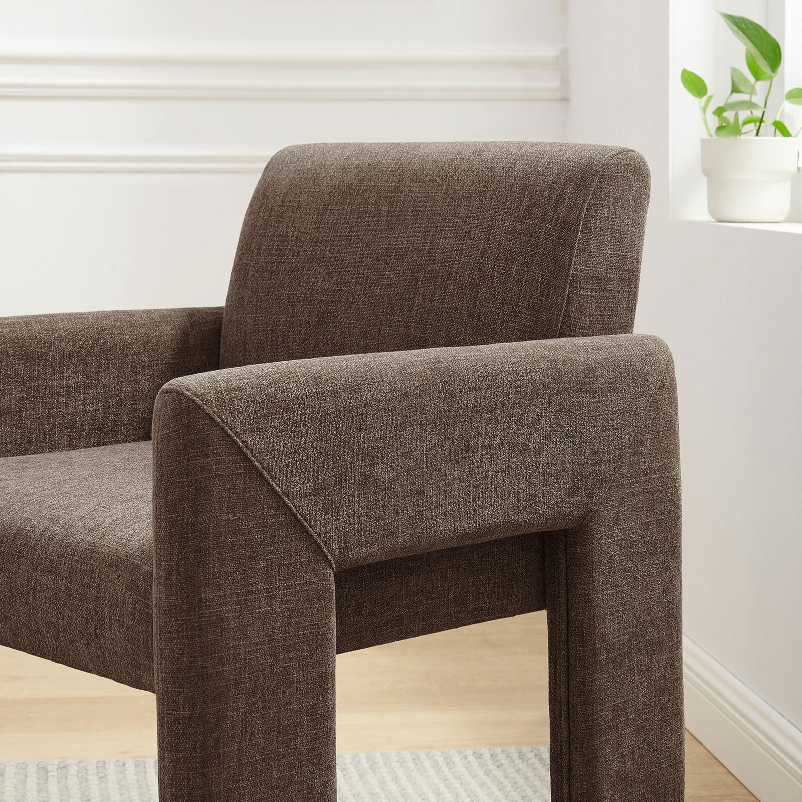 Daven mocha dining chair styled beside a bright window to bring soft comfort to modern decor || EEI-7524-MOC || front_angle_room