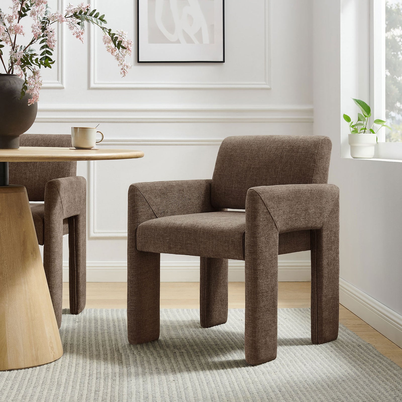 Mocha Daven dining chair paired with a round wood table to create a warm contemporary dining space || EEI-7524-MOC || front_angle_room