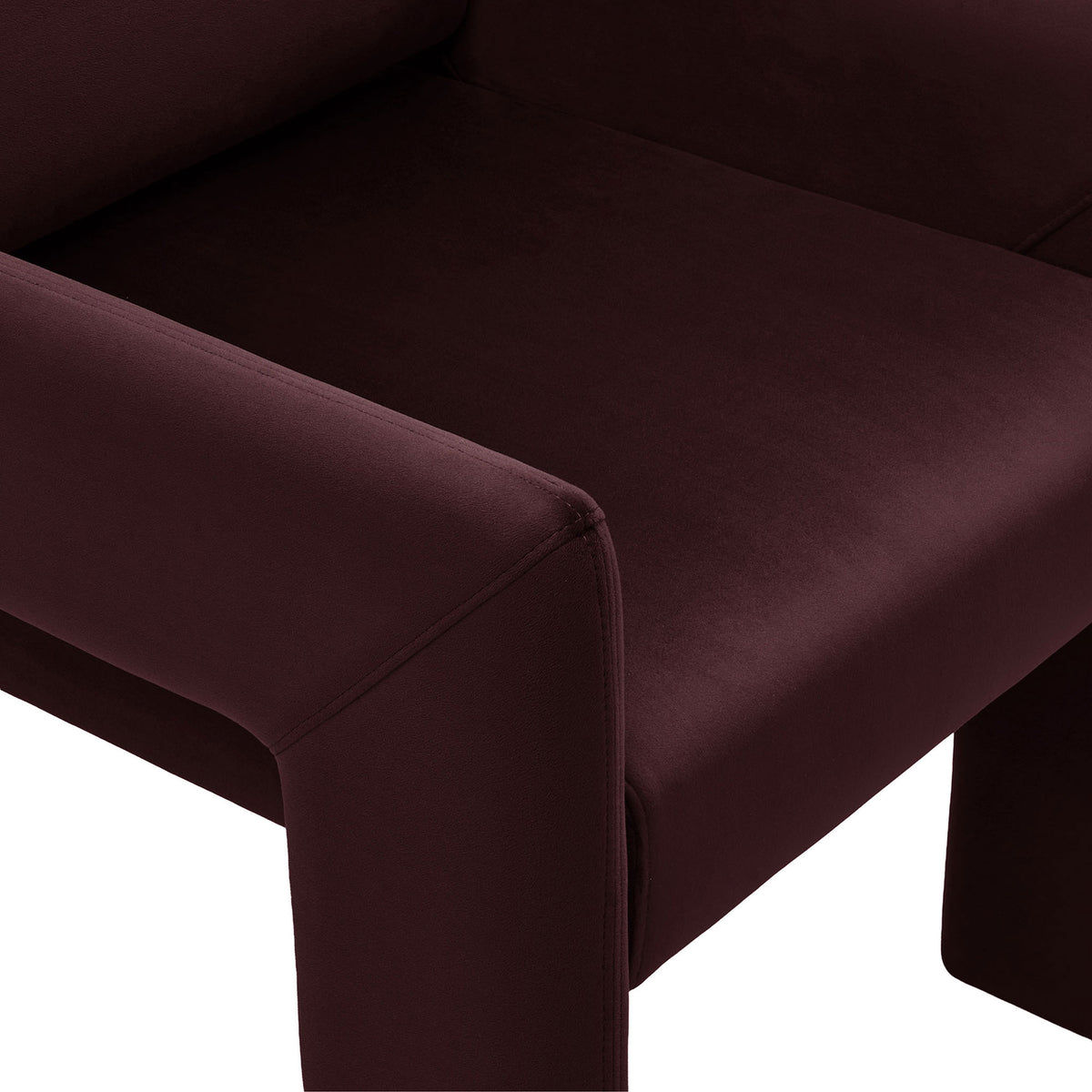 Mulberry velvet upholstery highlighting soft texture and tailored corner seams || EEI-7525-MUL || detail_studio