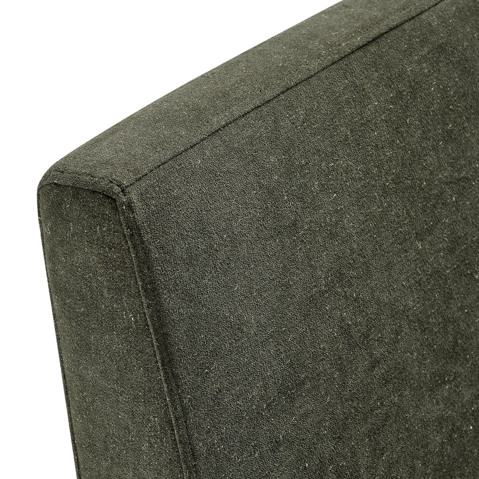 Close-up of textured linen-blend fabric and neatly tailored seams on the sage slipcover || EEI-7528-SGE || detail_studio