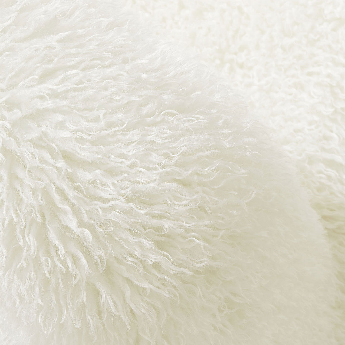 Shaggy faux fur texture adds playful softness and tactile appeal. || EEI-7534-WHI || detail_studio