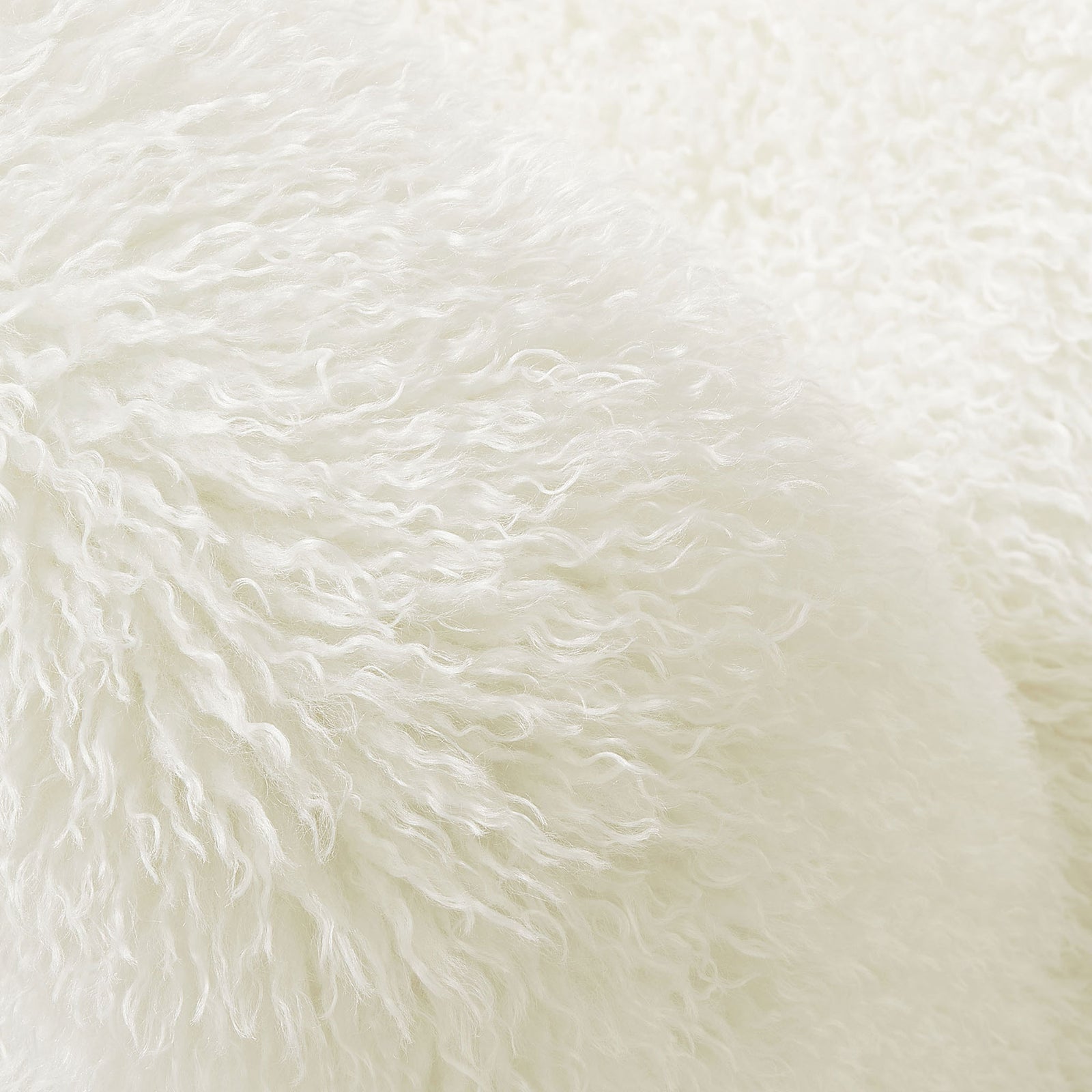 Shaggy faux fur texture adds playful softness and tactile appeal. || EEI-7534-WHI || detail_studio
