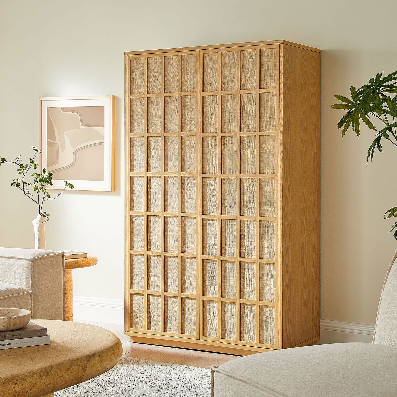 Aiko tall Japandi cabinet anchors a calm living room with soft furnishings, greenery, and natural light || EEI-7560-LOA || front_angle_room