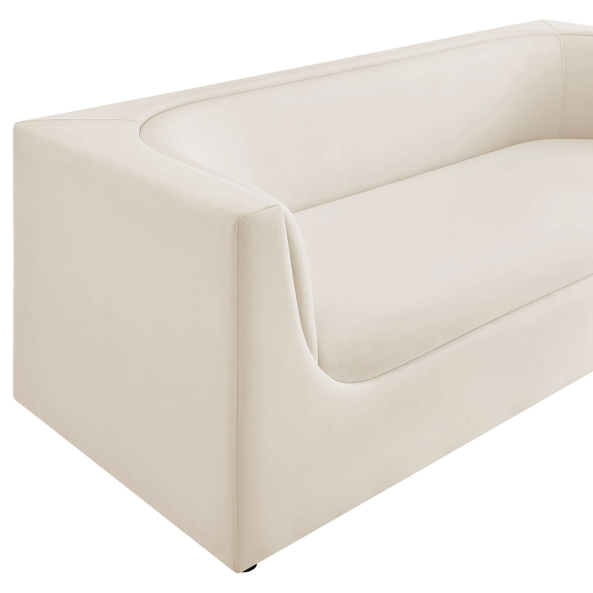 Close view of the smooth performance velvet and tailored seams accenting the sofa's curved arm. || EEI-7564-ALA || detail_studio