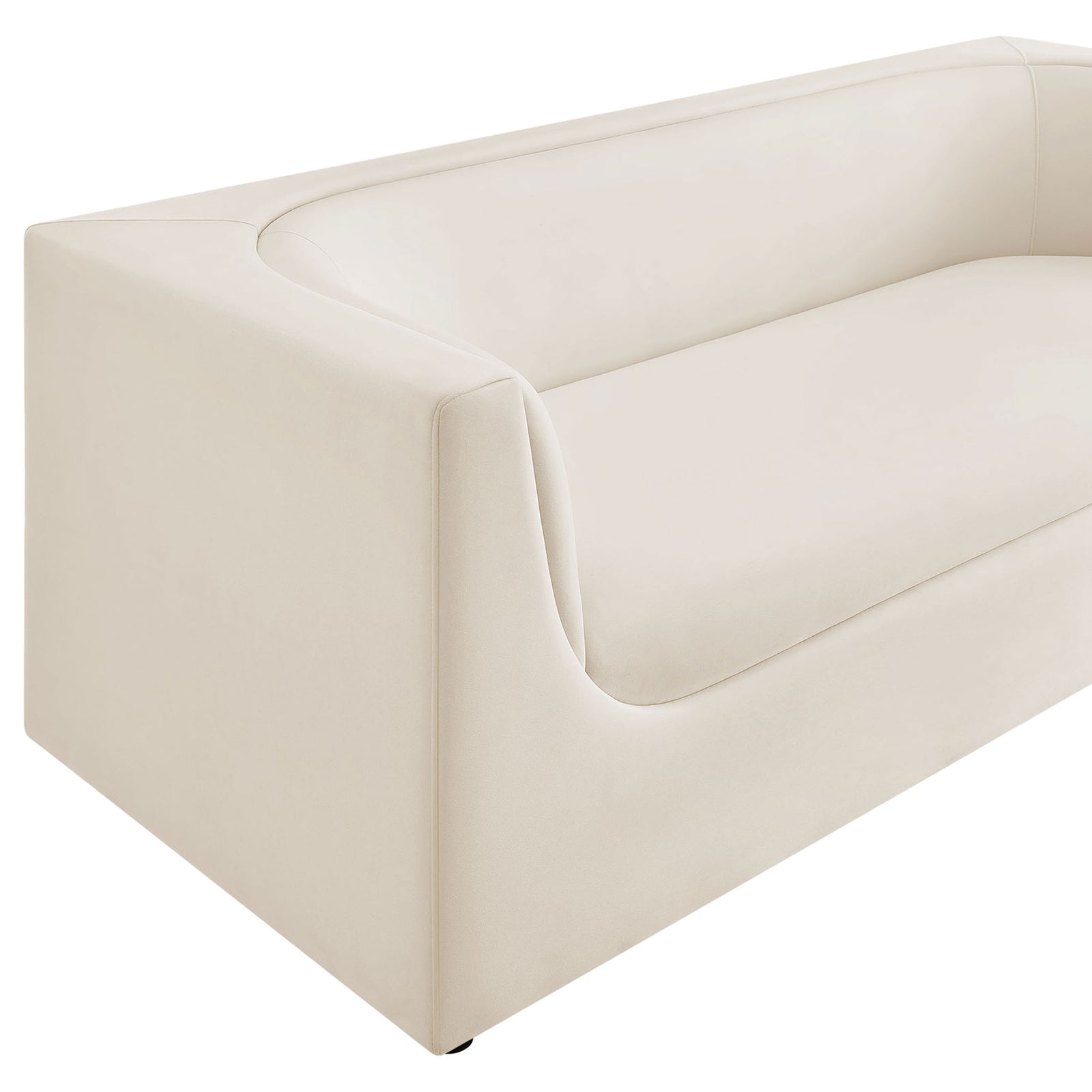 Close view of the smooth performance velvet and tailored seams accenting the sofa's curved arm. || EEI-7564-ALA || detail_studio