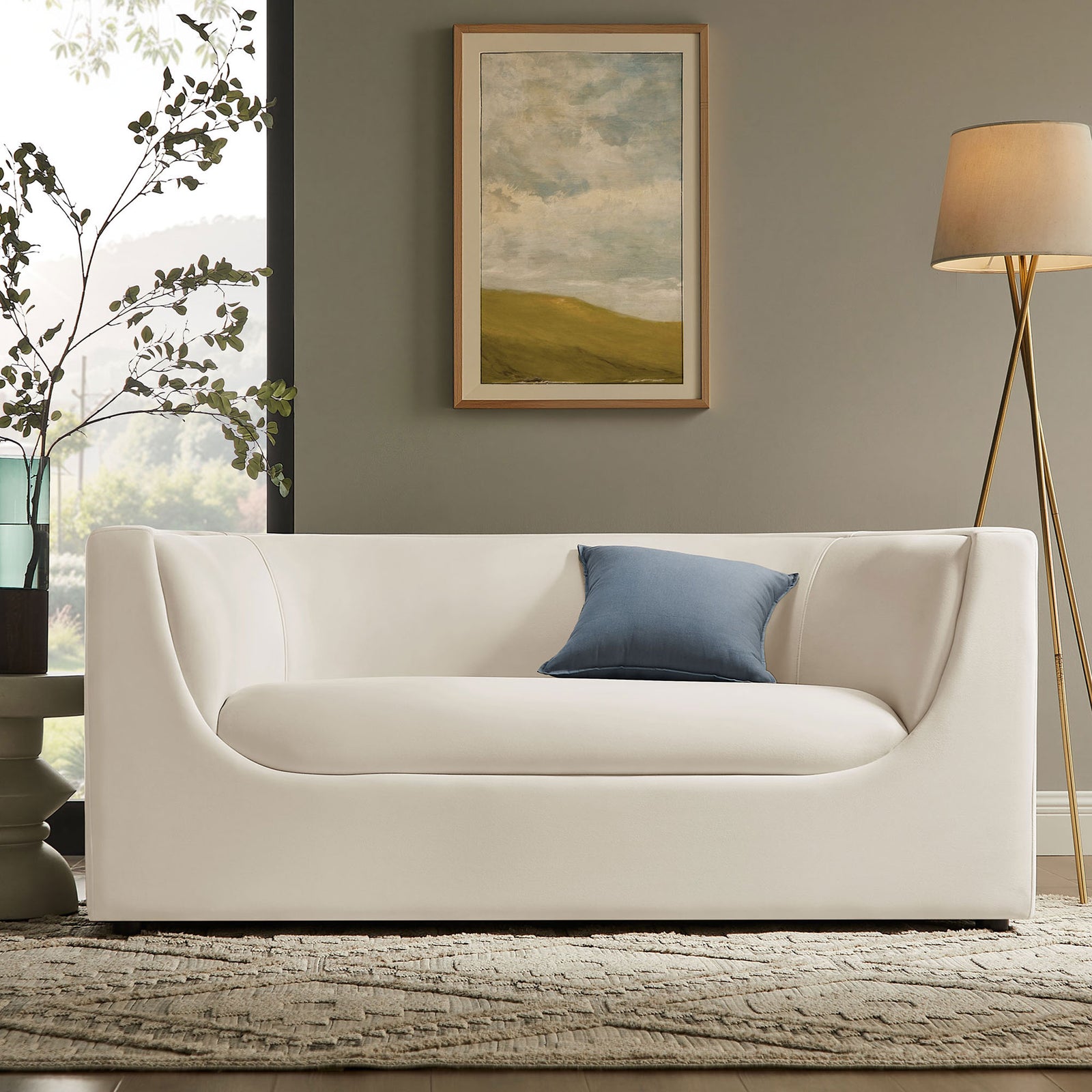 Hilda alabaster velvet loveseat anchoring a cozy living room with rug, artwork, greenery, and floor lamp || EEI-7565-ALA || front_room