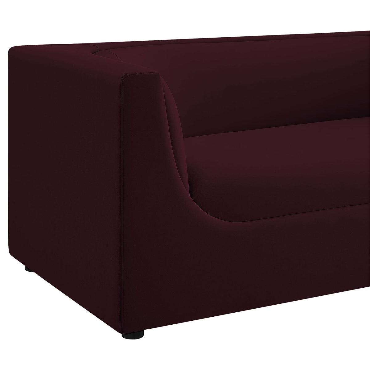 Sculpted arm and plush seat cushion of the mulberry velvet loveseat in rich mulberry velvet || EEI-7565-MUL || detail_studio