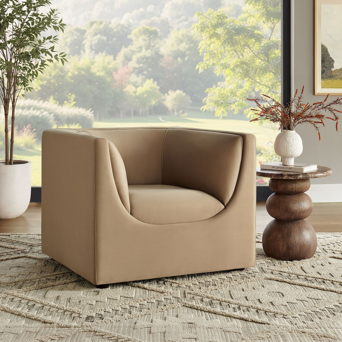 Elevates the room with warm taupe velvet, geometric form, and cozy embrace. || EEI-7566-TAU || front_angle_room
