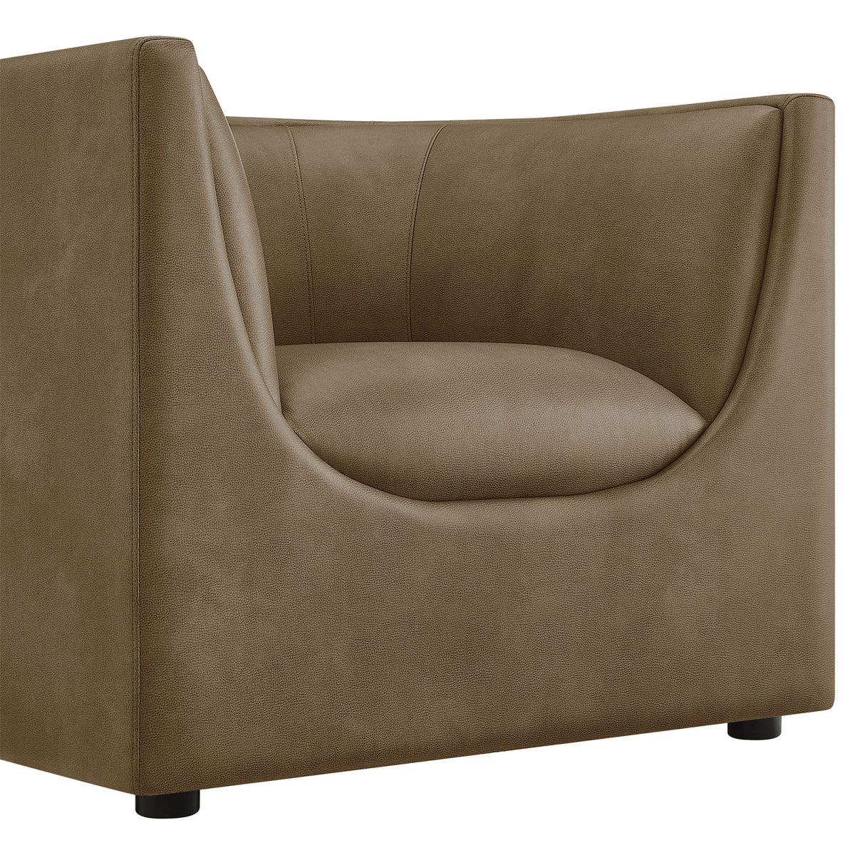 Pebbled vegan leather and neat stitching showcase craftsmanship and comfort in this modern armchair. || EEI-7569-MUS || detail_studio
